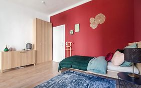 Colorful Apartment Facing Green Courtyard